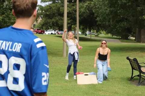 Abstrakt team members at a cornhole game at the 2026 Company Picnic