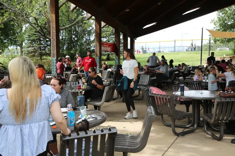 Abstrakt team members at lunch under the pavilion at the 2026 Company Picnic