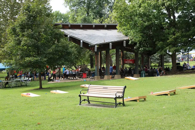 Abstrakt team members playing cornhole at the 2026 Company Picnic