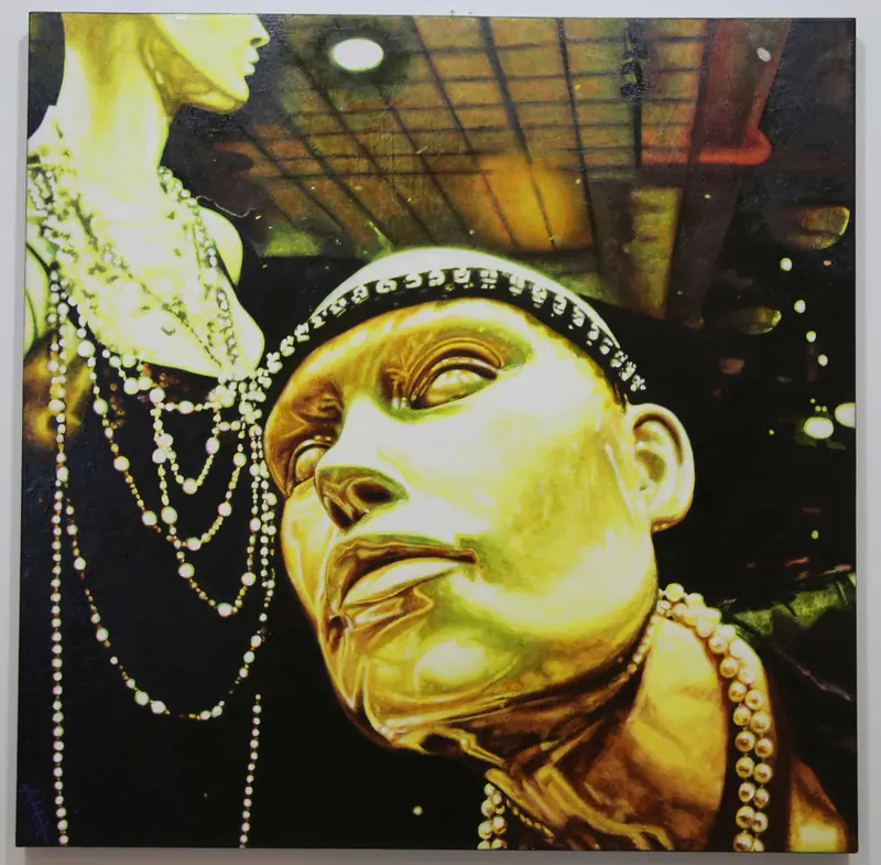 Realist painting of gold mannequin heads draped in strings of pearls.