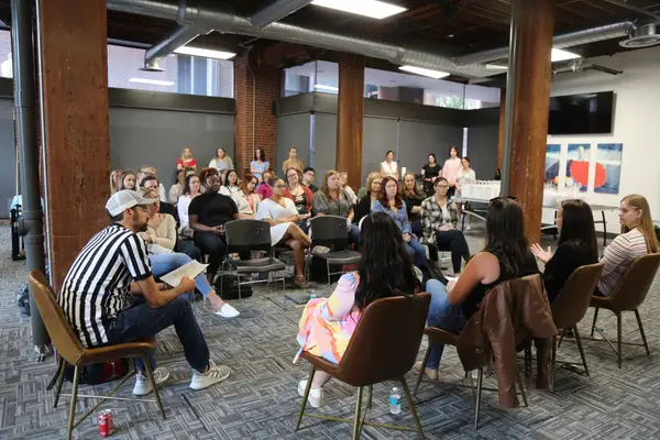 Team members seated for the Women's ERG panel at Wine Down Wednesday