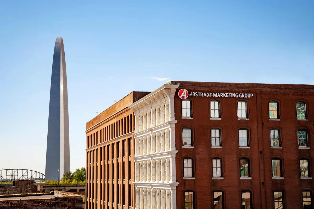 The Abstrakt building in downtown St. Louis beside the Gateway Arch