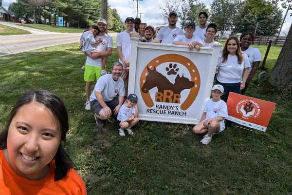 A volunteer crew with the Randy's Rescue Ranch banner, 2024