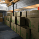 Moving boxes stacked in hall