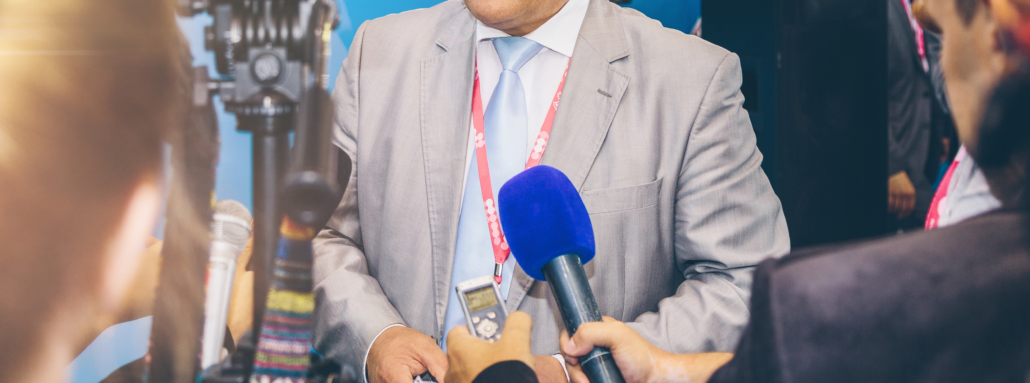 What SDRs and Sports Reporters Have in Common Interviewing businessman on press