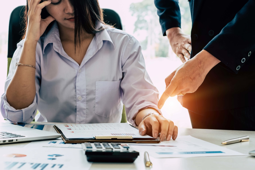 How Can Your Business Increase B2B Sales? stressed out salesperson listening to her boss