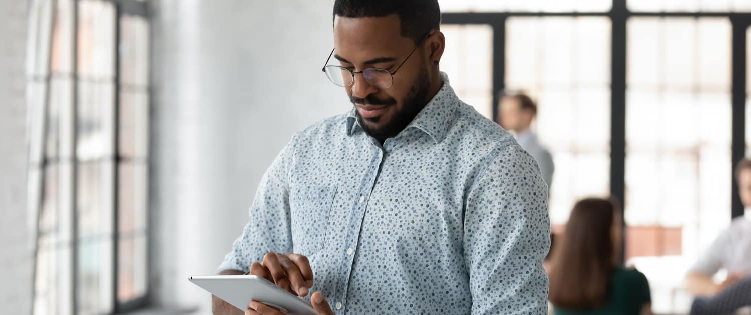 How To Reduce the Sales Cycle person working on tablet