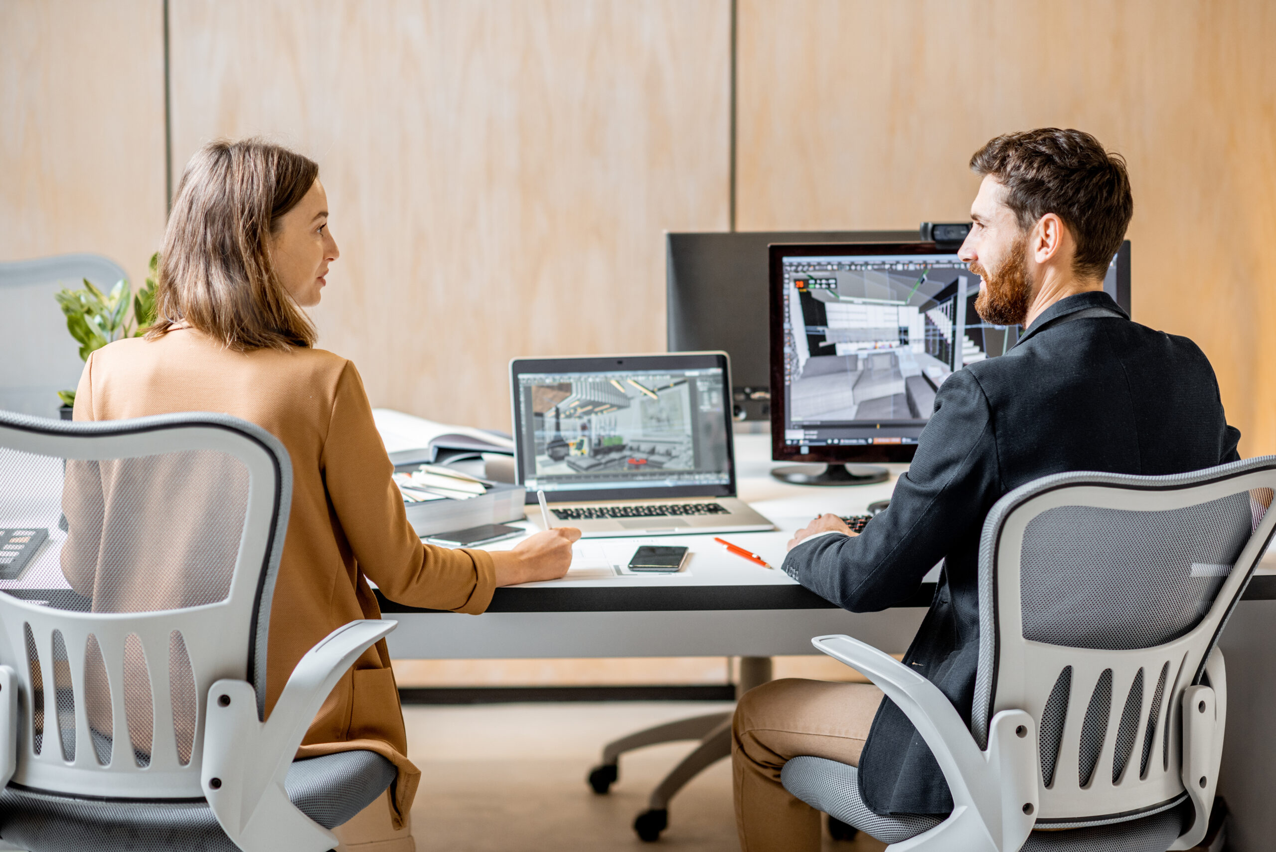 Inbound lead generation for architects in front of computer